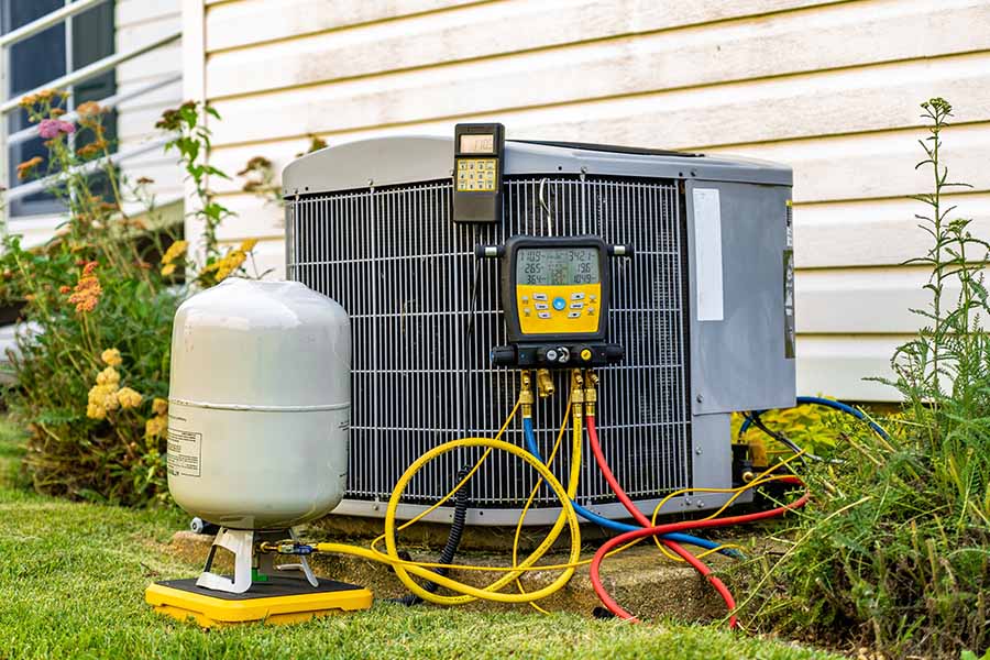 AC unit with refrigerant gauges